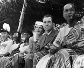 Vice President Richard M. Nixon attends Ghana’s independence celebration in March 1957. Nixon, pictured here with his wife, Pat Nixon, and Finance Minister K. A. Gbedemah of Ghana, believed the United States needed to support newly independent African countries in order to block Communist influences on them. 